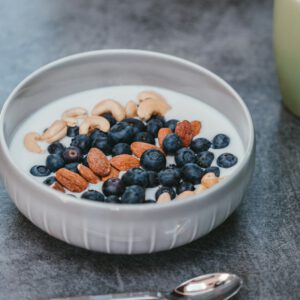 white ceramic bowl with brown and black beans